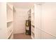 Walk-in closet with built-in shelves and storage solutions at 22 Sand Dune Dr, New Smyrna Beach, FL 32169