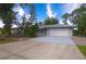 Charming single-story home with well-maintained landscaping, spacious driveway, and two-car garage at 2548 Crestwood Ave, New Smyrna Beach, FL 32168