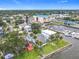 Scenic aerial view of a waterfront community with boat docks and a prominent blue and yellow building at 255 Lexington Dr, Daytona Beach, FL 32114