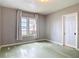 Bedroom featuring waterfront views, natural light, and neutral walls at 255 Lexington Dr, Daytona Beach, FL 32114