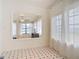 Bright dining room with decorative tile and large windows providing water views at 255 Lexington Dr, Daytona Beach, FL 32114