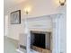 Close-up of fireplace and decorative molding in the living room at 255 Lexington Dr, Daytona Beach, FL 32114