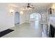 Open living room featuring fireplace, decorative lights, and archways to other rooms at 255 Lexington Dr, Daytona Beach, FL 32114