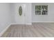 Bright entryway featuring stylish flooring, a modern door, and ample natural light at 2617 Pine Tree Dr, Edgewater, FL 32141