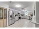 Spacious kitchen with stainless steel appliances and gray cabinets at 2715 Pine Tree Dr, Edgewater, FL 32141