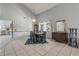 Spacious open concept dining and living area features vaulted ceilings and abundant natural light at 2715 Pine Tree Dr, Edgewater, FL 32141