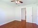 Bedroom boasts hardwood floors, fresh paint, with an en-suite bathroom and a closet for ample storage at 3045 Pine Tree Dr, Edgewater, FL 32141
