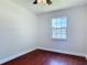 Bright bedroom features beautiful wood-look floors and a window for natural light at 3045 Pine Tree Dr, Edgewater, FL 32141