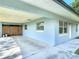 Covered carport providing ample parking and storage space at 3045 Pine Tree Dr, Edgewater, FL 32141