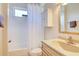 Neat bathroom with a shower/tub combination and a light wood vanity at 3288 Spruce Creek Gln, Port Orange, FL 32128