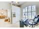 Bright office space with ample natural light, a ceiling fan, and neutral decor at 3288 Spruce Creek Gln, Port Orange, FL 32128