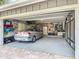 This garage features epoxy flooring, well-organized storage, utility sink, and room for parking at 343 Sweet Bay Ave, New Smyrna Beach, FL 32168