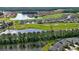 Panoramic aerial view of the Venetian Bay community, with beautiful lakes and a golf course at 349 Caryota Ct, New Smyrna Beach, FL 32168