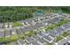 Community aerial showing a well-planned neighborhood with tennis and pickle ball courts available for residents at 349 Caryota Ct, New Smyrna Beach, FL 32168