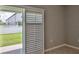 View from the covered patio shows a well-maintained lawn and white fence for outdoor enjoyment and privacy at 349 Caryota Ct, New Smyrna Beach, FL 32168