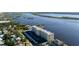An aerial view of a building near the coast and a long river at 3606 S Peninsula Dr # 406, Port Orange, FL 32127