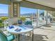 Community area with jigsaw puzzle table, bright windows, and water views at 3606 S Peninsula Dr # 406, Port Orange, FL 32127