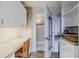 This closet is complete with a desk, lots of shelves and hanging space at 3700 S Atlantic Ave # 108, New Smyrna Beach, FL 32169