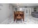 Charming dining room with a wood table set, decorative lighting, and sliding glass doors to the outdoor area at 38 Fairway Cir, New Smyrna Beach, FL 32168