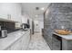 Modern kitchen with stylish cabinetry, sleek countertops, and stainless-steel appliances at 38 Fairway Cir, New Smyrna Beach, FL 32168