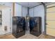 A functional laundry area with appliances and plenty of space at 38 Fairway Cir, New Smyrna Beach, FL 32168