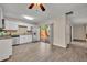 Open kitchen featuring stainless steel appliances and sliding glass doors to the backyard at 3824 Saxon Dr, New Smyrna Beach, FL 32169