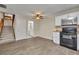 Open concept kitchen and stairs leading to the second floor at 3824 Saxon Dr, New Smyrna Beach, FL 32169
