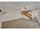 Bright living room with hardwood floors and a staircase at 3824 Saxon Dr, New Smyrna Beach, FL 32169