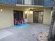 Covered patio with outdoor seating and sliding glass doors leading to interior space at 3824 Saxon Dr, New Smyrna Beach, FL 32169