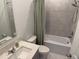 Clean bathroom featuring a tub with tiled walls and a white vanity at 3919 Willowbrook Dr, Edgewater, FL 32141