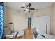 Spacious office boasts a ceiling fan, hardwood floors, and ample seating area at 411 Ryans Ridge Ave, Eustis, FL 32726