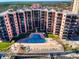 Beachfront condo complex with a central pool and direct beach access at 4141 S Atlantic Ave # 605, New Smyrna Beach, FL 32169
