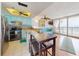 Bright kitchen featuring stainless steel appliances and a breakfast bar at 4141 S Atlantic Ave # 605, New Smyrna Beach, FL 32169