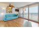 Living room with hardwood floors, modern furnishings and ocean view at 4141 S Atlantic Ave # 605, New Smyrna Beach, FL 32169