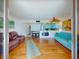 Open concept living area with hardwood floors, modern furnishings and view at 4141 S Atlantic Ave # 605, New Smyrna Beach, FL 32169