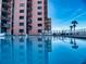 A beachfront pool in front of a condo complex at 4141 S Atlantic Ave # 605, New Smyrna Beach, FL 32169