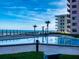 The property features a pool with ocean views, creating a relaxing ambiance that complements the beachside lifestyle at 4141 S Atlantic Ave # 605, New Smyrna Beach, FL 32169