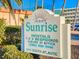 Sunrise Rentals signage with information on 1-2-3 bedroom rentals, office details and the address at 4141 South Atlantic at 4141 S Atlantic Ave # 605, New Smyrna Beach, FL 32169