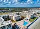 Wonderful aerial view of oceanfront condos with pool deck and ocean views at 4175 S Atlantic Ave # 4110, New Smyrna Beach, FL 32169