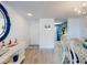 Open living space featuring tile floors, a dining area and blue cabinetry kitchen at 4175 S Atlantic Ave # 4110, New Smyrna Beach, FL 32169