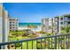 Enjoy ocean views from the balcony overlooking manicured lawns, palm trees and a sparkling pool at 4175 S Atlantic Ave # 4110, New Smyrna Beach, FL 32169
