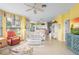 Open-concept living area featuring comfortable seating, and a clear view of the adjacent kitchen at 438 Bouchelle Dr # 105, New Smyrna Beach, FL 32169