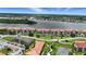 Stunning aerial view showcasing condos, waterfront access, and picturesque neighborhood at 454 Bouchelle Dr # 102, New Smyrna Beach, FL 32169