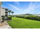 Relax in this expansive backyard with views of the bay at 454 Bouchelle Dr # 102, New Smyrna Beach, FL 32169