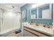 Bright bathroom featuring a walk-in shower and stylish decor at 454 Bouchelle Dr # 102, New Smyrna Beach, FL 32169