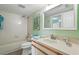Bright bathroom featuring a tub, shower, and vanity at 454 Bouchelle Dr # 102, New Smyrna Beach, FL 32169
