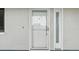 Close up of front door at 454 Bouchelle Dr # 102, New Smyrna Beach, FL 32169