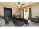 Relaxing bedroom showcasing a serene decor with a modern dresser and natural light streaming through the window at 4623 Secret River Trl, Port Orange, FL 32129