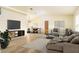 Spacious open-concept living area with modern decor and abundant natural light at 4623 Secret River Trl, Port Orange, FL 32129