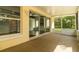 Comfortable, screened-in porch, providing a serene transition between indoor and outdoor living spaces at 4623 Secret River Trl, Port Orange, FL 32129